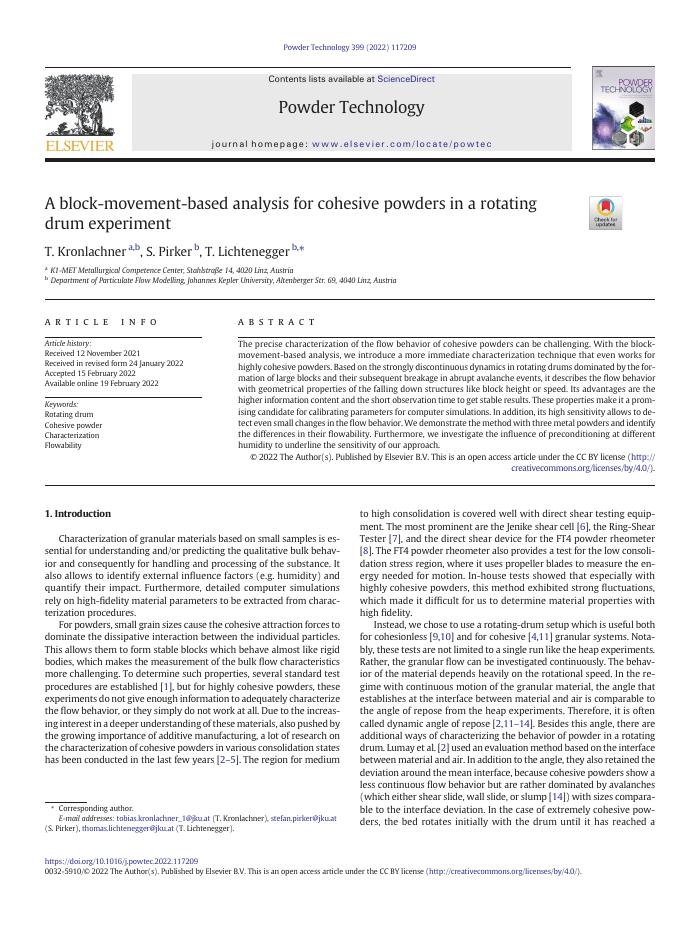 A block-movement-based analysis for cohesive powders in a rotating drum experiment